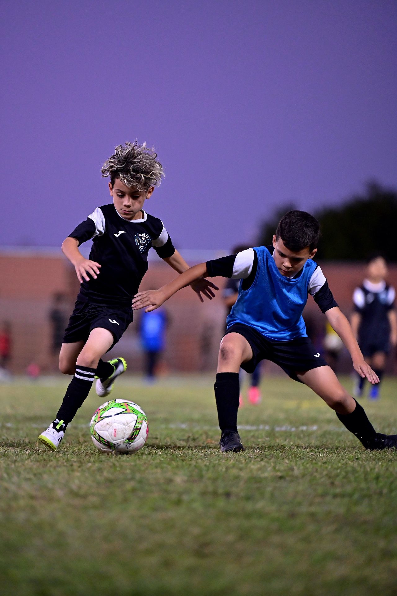Hialeah City youth players competing for the ball during training.
